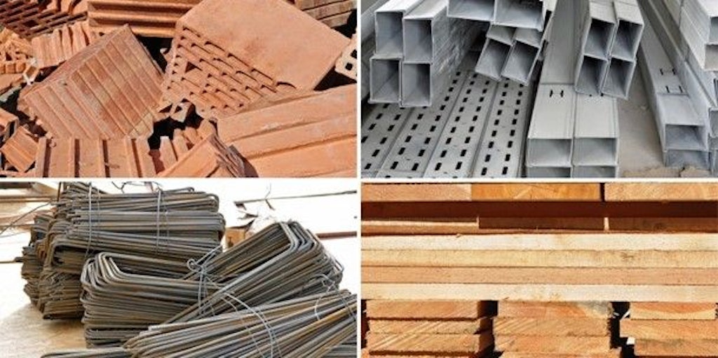 Diversi tipi di prodotti da costruzione (mattoni, strutture metalliche e assi di legno